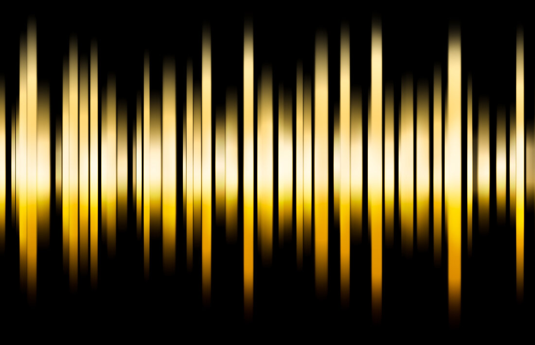 Golden sound wave on black background